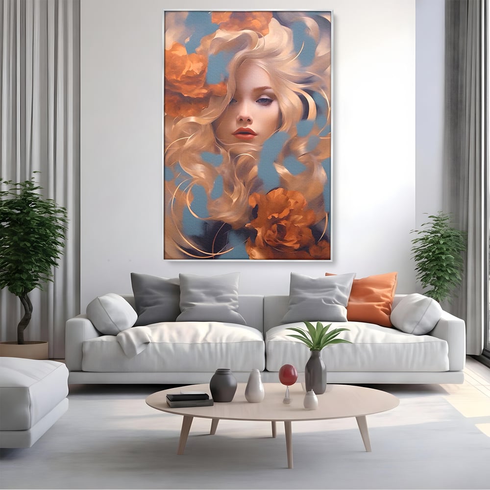 Tablou canvas cu portret de femeie cu flori portocalii, in rama de aluminiu argintiu, pe perete intr-un living